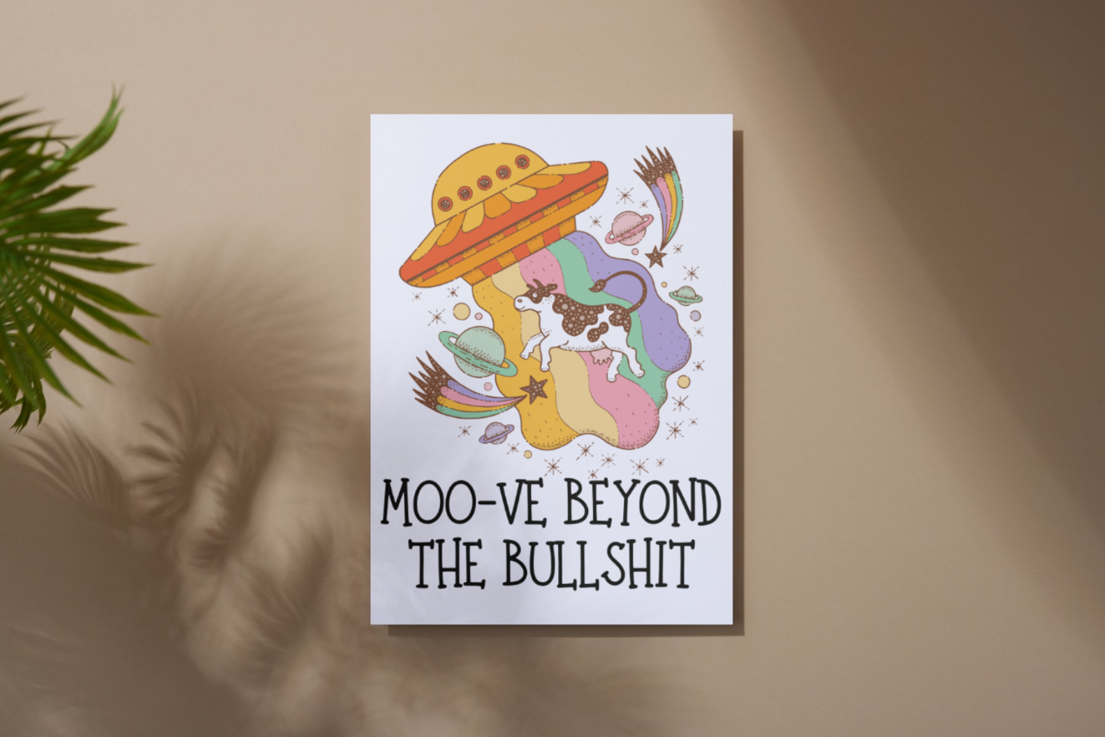 A colorful 8x10 metal sign featuring an artistic representation of a cow being abducted by a UFO with the inspirational text ‘Moo-ve Beyond the Bullshit.